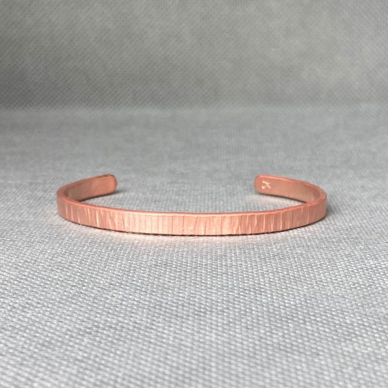 Pulsera de cobre rayada